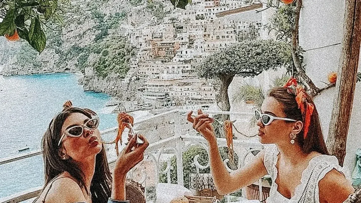 Dining at Scalini restaurant in Cannes with scenic views and delicious food.